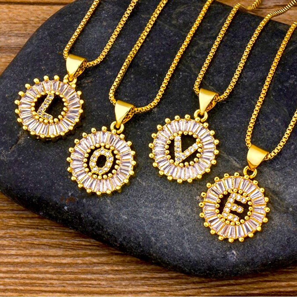 Beautiful personalized chains with letters. Silver with gold plated.